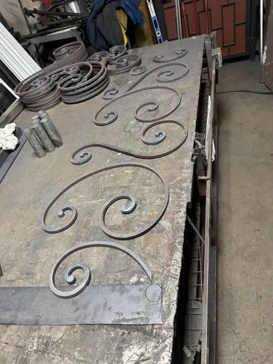 Decorative scroll elements arranged during fabrication