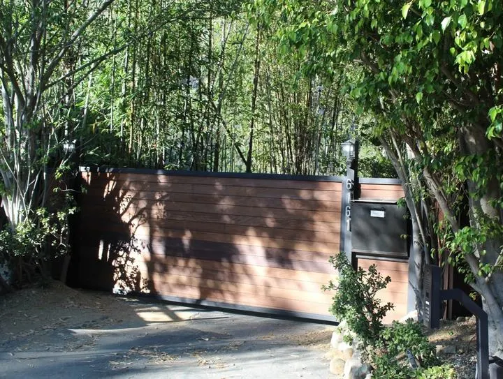 Wood driveway gate and pedestrian entry