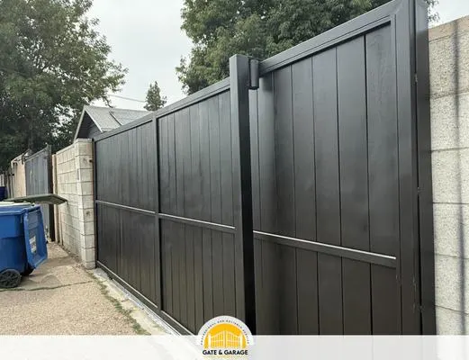 Tall vertical-panel gate shown closed