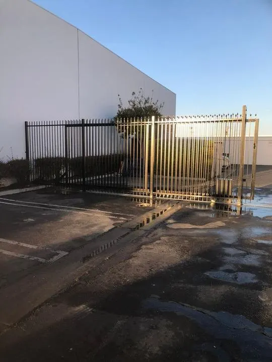 Wider view of the same light-finish industrial entrance.