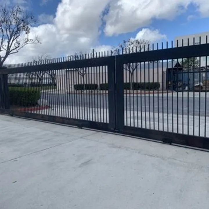 Open-picket commercial vehicle entrance.