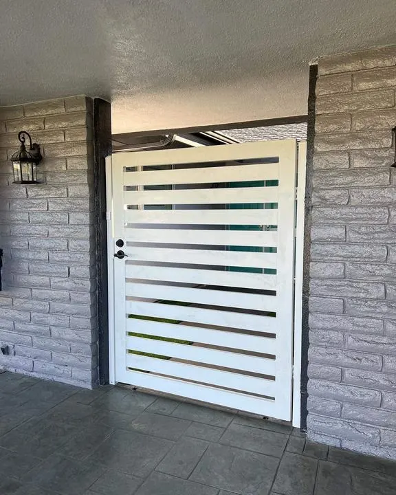 White horizontal pedestrian gate